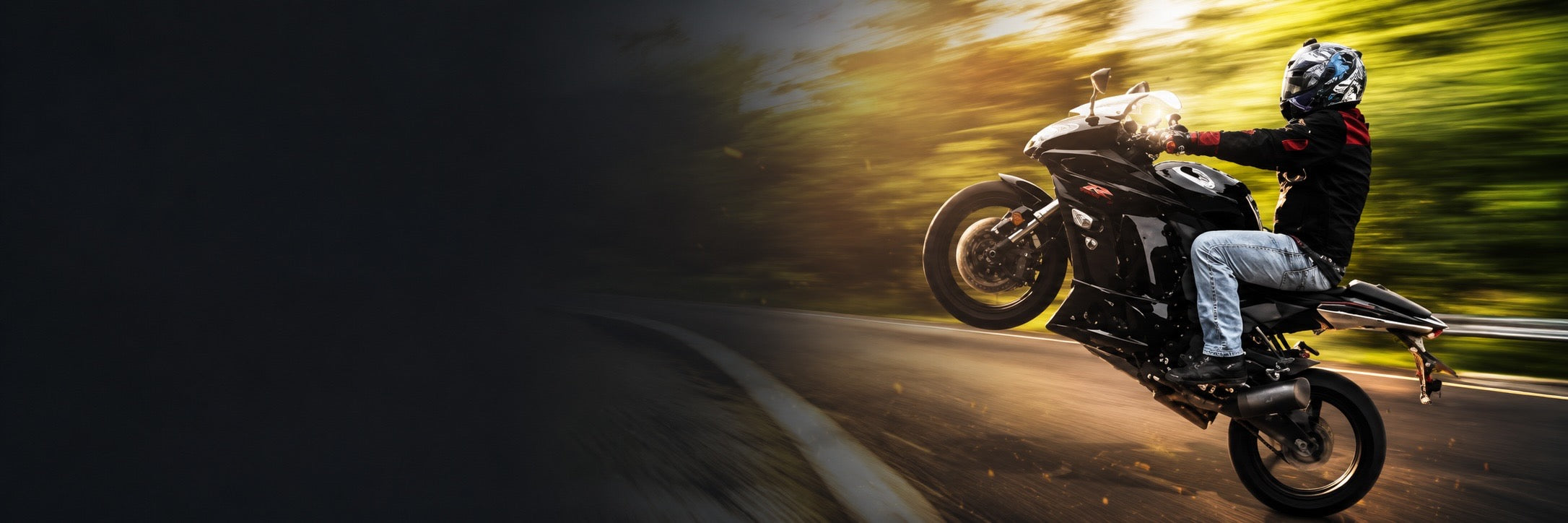Tony Wyatt today, popping a wheelie on a motorcycle — 30+ years on FCSS Pro.